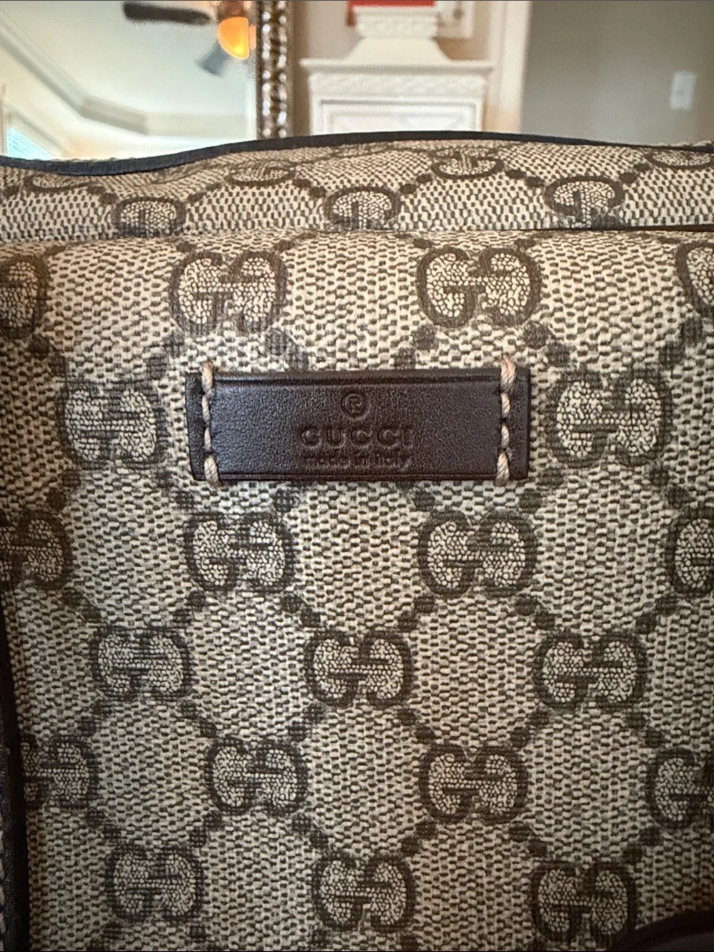 Authentic Gucci Beige Brown GG Supreme Rolling Duffel with Dark Brown Trim